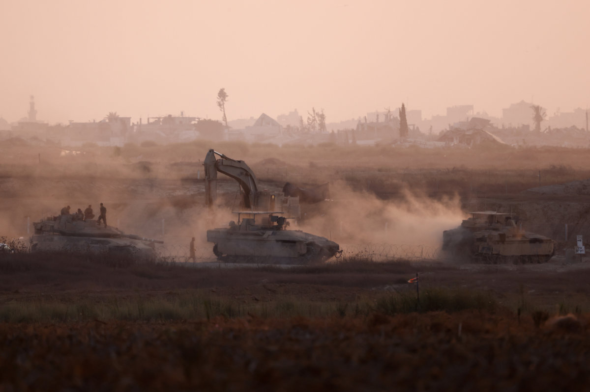 Israeli military vehicles maneuver near the Israel-Gaza border on July 25, 2024, amid the conflict between Israel and Hamas. (REUTERS)