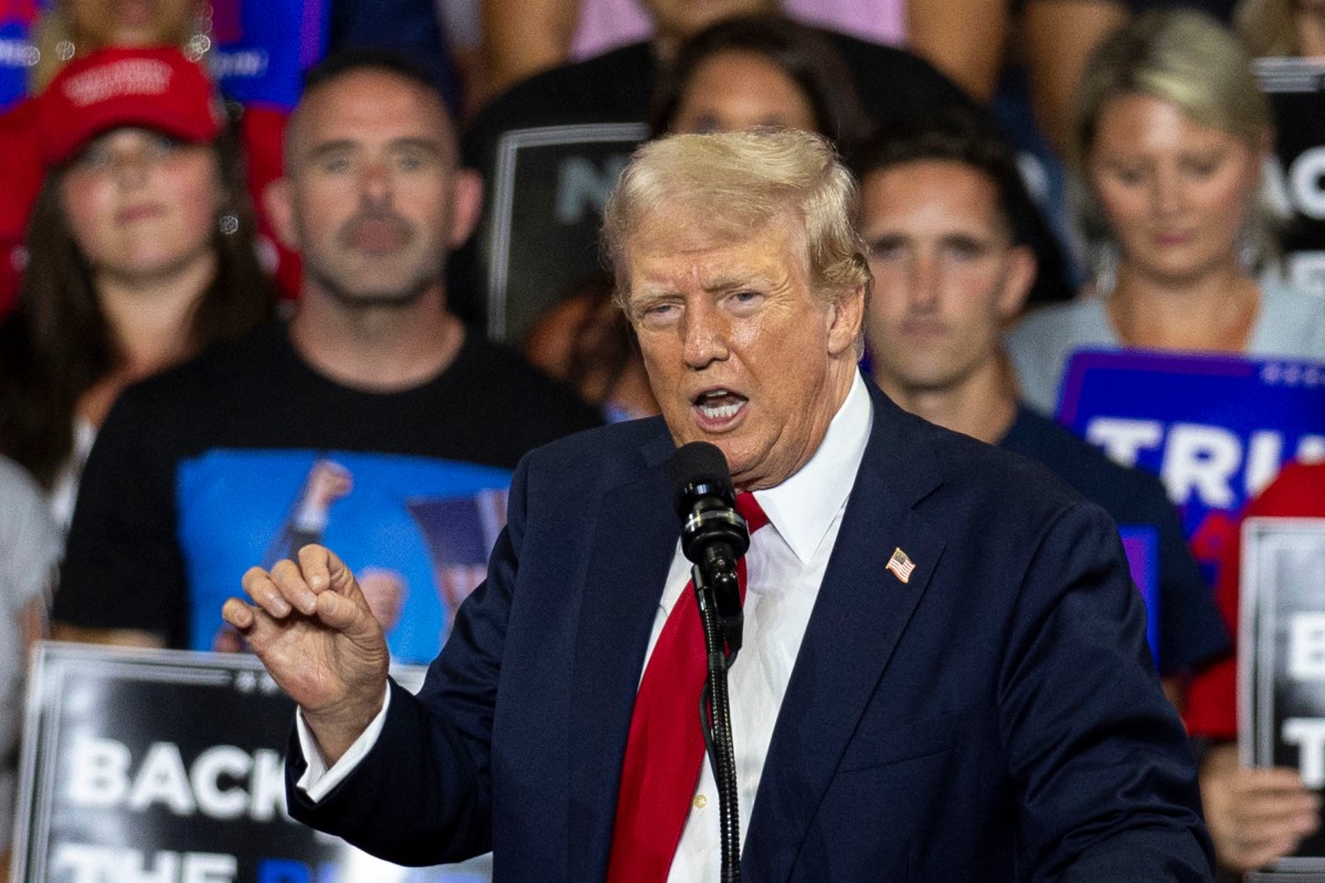 Former US President and 2024 Republican presidential candidate Donald Trump gestures as he speaks during a campaign rally at the Bojangles Coliseum in Charlotte, North Carolina, on July 24, 2024. (AFP)