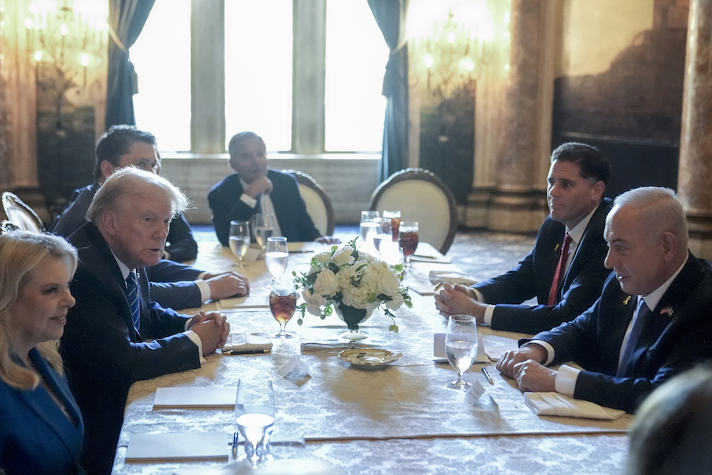 Republican presidential candidate former President Donald Trump meets with Israeli Prime Minister Benjamin Netanyahu at his Mar-a-Lago estate, Friday, July 26, 2024. (AP)