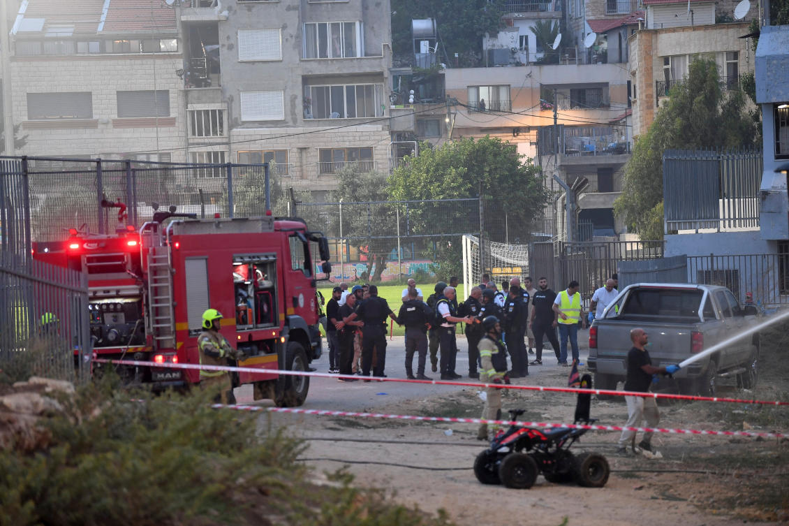 Israeli officials respond after rockets were launched across Lebanon’s border with Israel which, according to Israel’s ambulance services critically injured multiple people at a soccer pitch in Majdal Shams, a Druze village in the Israeli-occupied Golan Heights, July 27 2024. (Reuters)