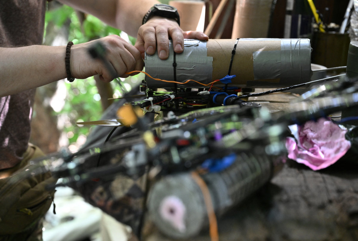 A Ukrainian serviceman prepares an FPV drone to launch towards Russian positions in the Donetsk region, on June 10, 2024, amid the Russian invasion of Ukraine. (AFP/File photo)