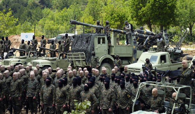 Fighters from the Lebanese militant group Hezbollah carry out a training exercise in Aaramta village in the Jezzine District, southern Lebanon, on May 21, 2023. (AP/File)