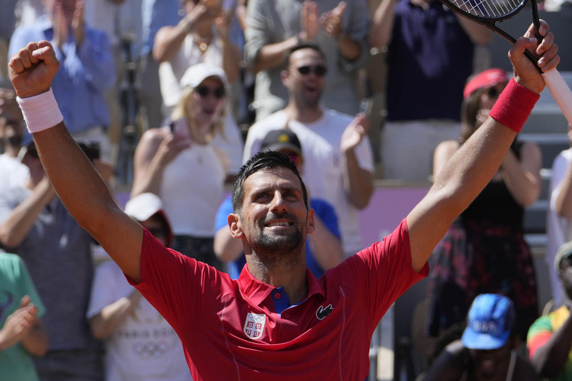 Serbia’s Novak Djokovic celebrates after defeating Spain’s Rafael Nadal in their men’s singles second round match at the Roland Garros stadium at the 2024 Summer Olympics, Monday, July 29, 2024, in Paris, France. Novak Djokovic dominated rival Rafael Nadal to win 6-1, 6-4 at the Paris Olympics in the second round. (AP)