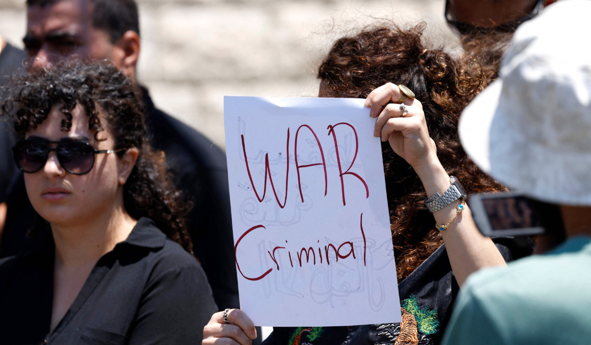 Citizens demonstrated against the Israeli Prime Minister during his visit to the Druze village of Majdal Shams in the Israel annexed Golan Heights on July 29, 2024, amid ongoing cross-border clashes between Israeli troops and Hezbollah fighters. (AFP)