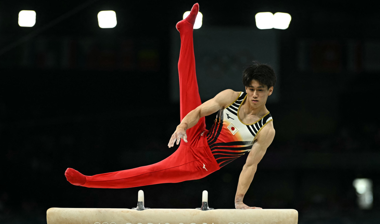Japan's Daiki Hashimoto competes in the pommel horse event of the artistic gymnastics men's team final during the Paris 2024 Olympic Games at the Bercy Arena in Paris, on July 29, 2024. (AFP)