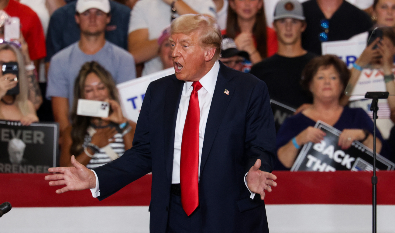 Former US President and 2024 Republican presidential candidate Donald Trump gestures on stage during a campaign rally at Herb Brooks National Hockey Center in Saint Cloud, Minnesota, on July 27, 2024. (AFP)
