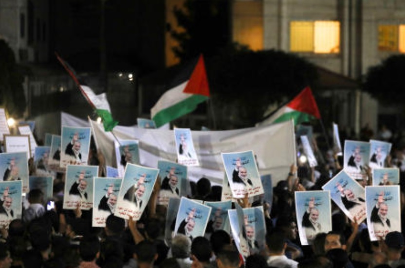 People protest following the assassination of Hamas leader Ismail Haniyeh in Iran, near the Israeli embassy in Amman on Jul. 31, 2024. (Reuters)