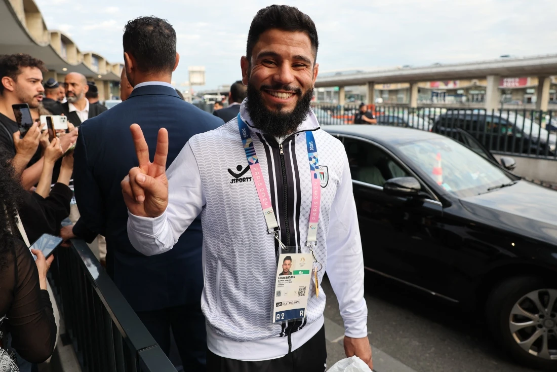 Palestinian judoka Fares Badawi was among the athletes of team Palestine to arrive at Charles-de-Gaulle airport in Roissy-en-France, north of Paris, on July 25, 2024. (Photo by Ahmad GHARABLI / AFP)