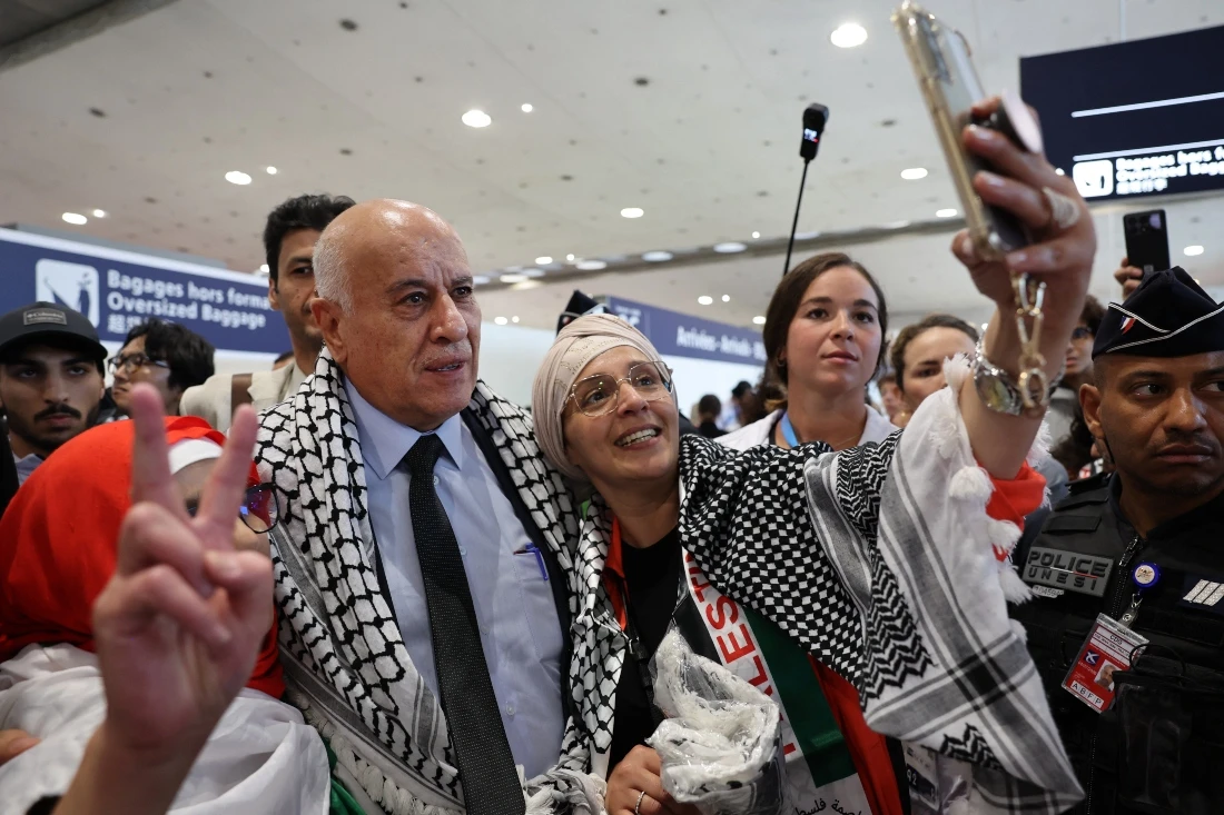 Jibril Rajoub, president of the Palestinian Football Association and the Palestine Olympic Committee, arrived with Palestinian Olympic athletes and members of the delegation. (Photo by Ahmad GHARABLI / AFP)