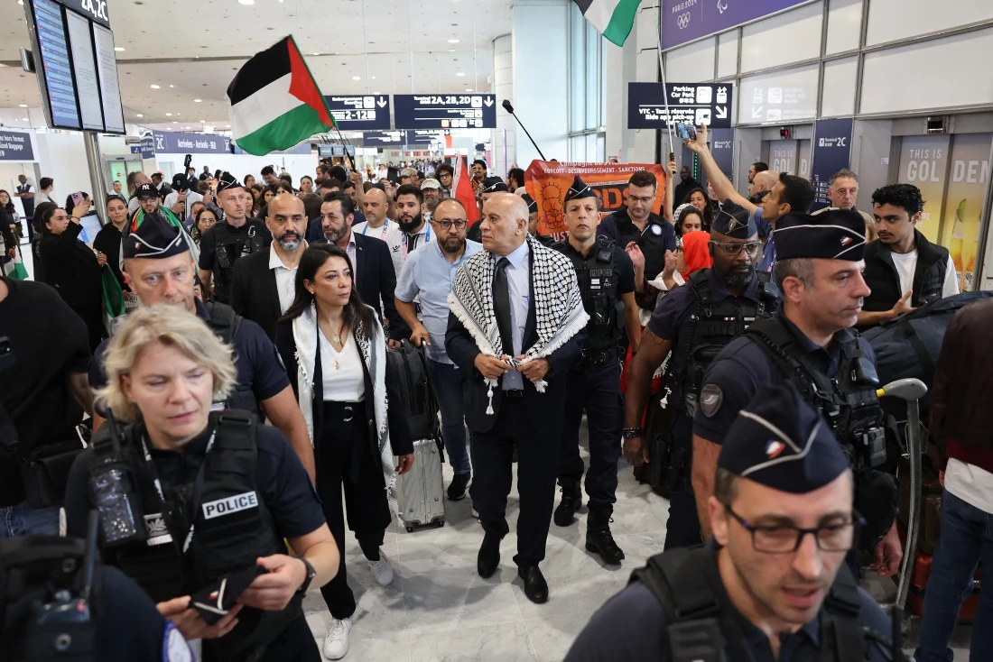 Jibril Rajoub, president of the Palestinian Football Association and the Palestine Olympic Committee, arrived with Palestinian Olympic athletes and members of the delegation. (Photo by Ahmad GHARABLI / AFP)
