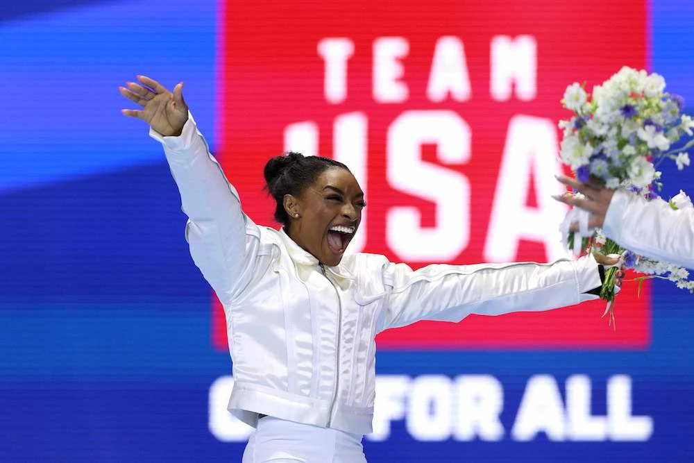 Simone Biles celebrates after being selected for the 2024 US Olympic Women’s Gymnastics Team on Day 4 of the 2024 US Olympic Team Gymnastics Trials at Target Center on June 30, 2024 in Minneapolis, Minnesota. (Getty Images North America /AFP)