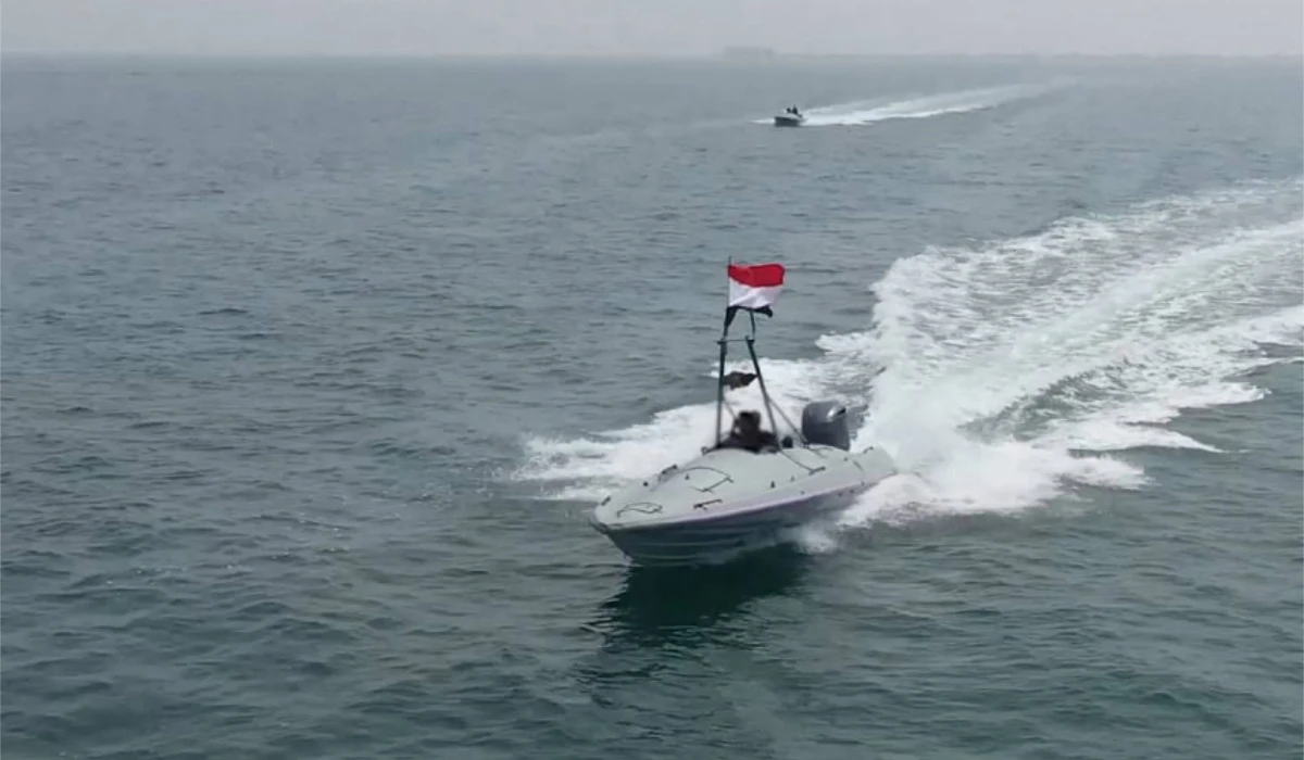 A handout picture obtained from Yemen's Huthi Ansarullah Media Center on June 30, 2024, shows what they said is the 'Tufan Destroyer' unmanned boat during exercises in an undisclosed area at sea. (AFP)