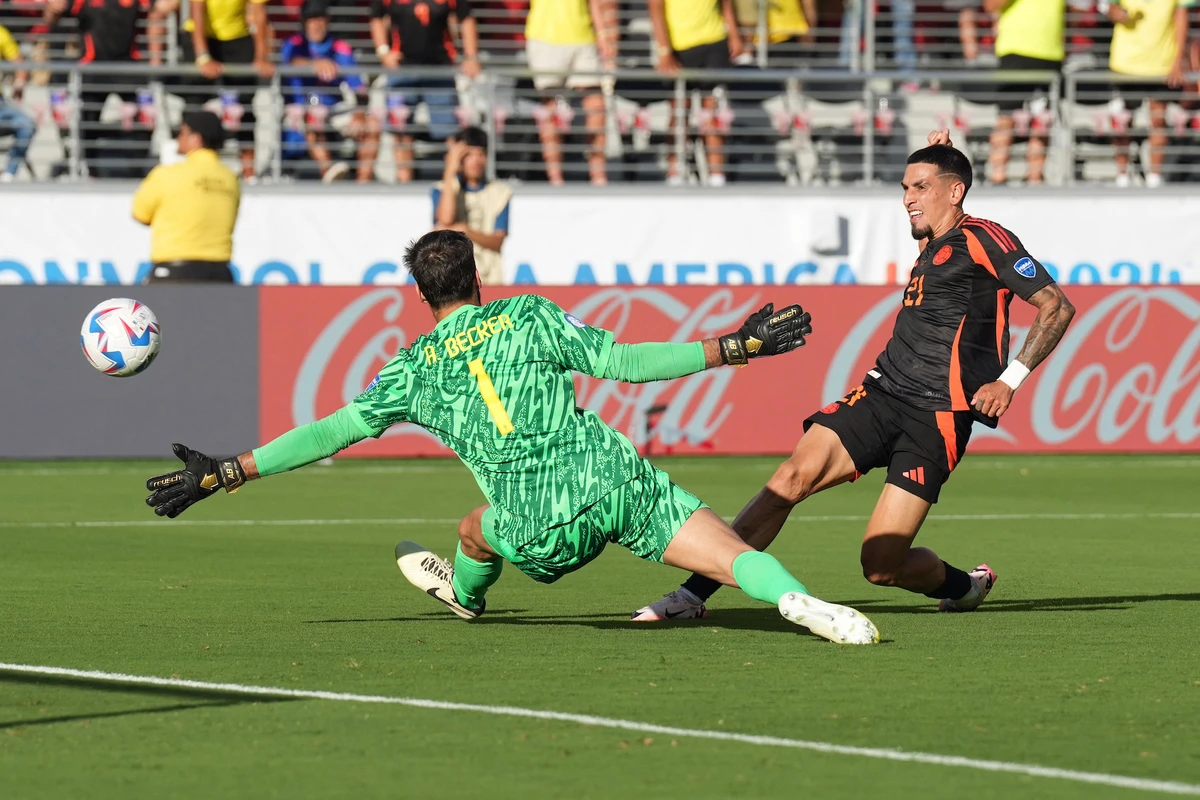 Colombia defender Daniel Munoz scores a goal against Brazil goalkeeper Alisson Becker during the first half of their Copa America Group D match at Levi's Stadium on Tuesday. USA TODAY Sports)