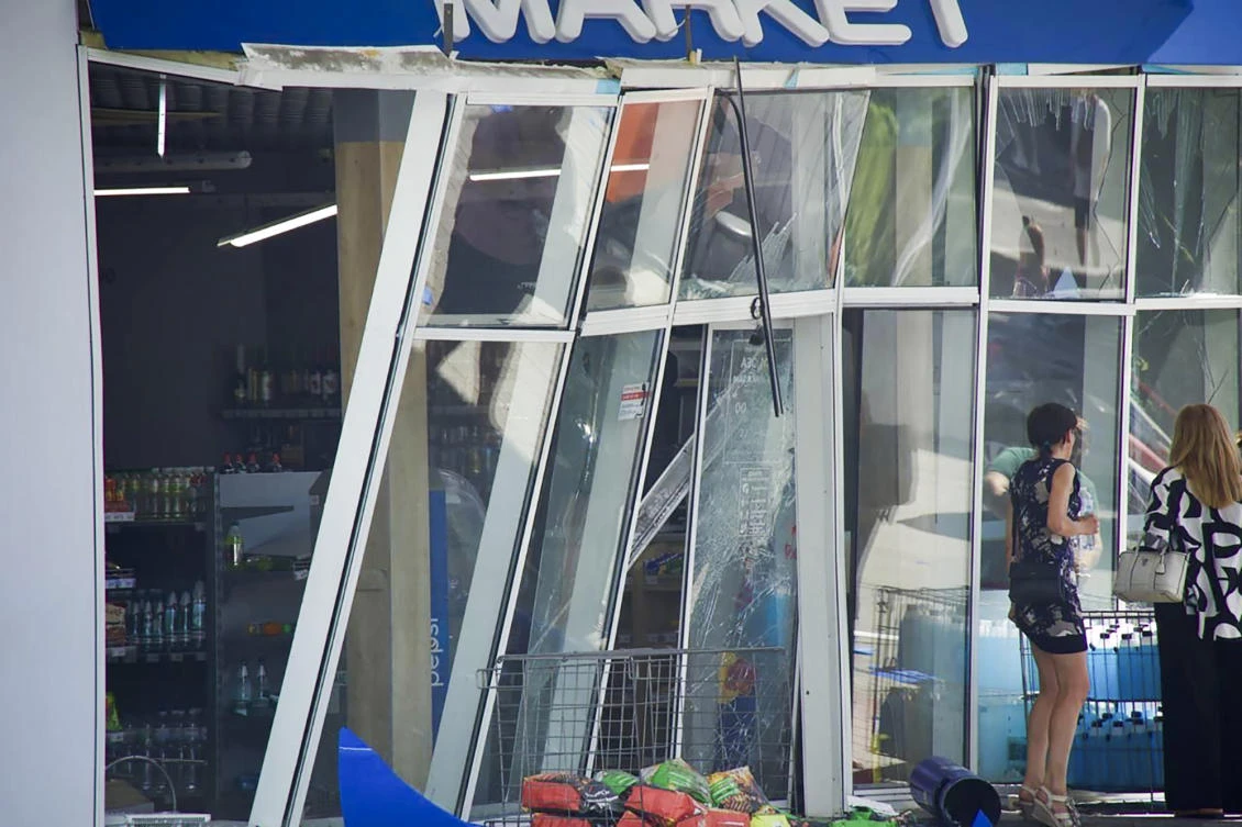 In this photo released by the Dnipro Regional Administration, people stand near shop windows damaged following Russia’s missile attack in Dnipro, on Jul. 3, 2024. (AP)