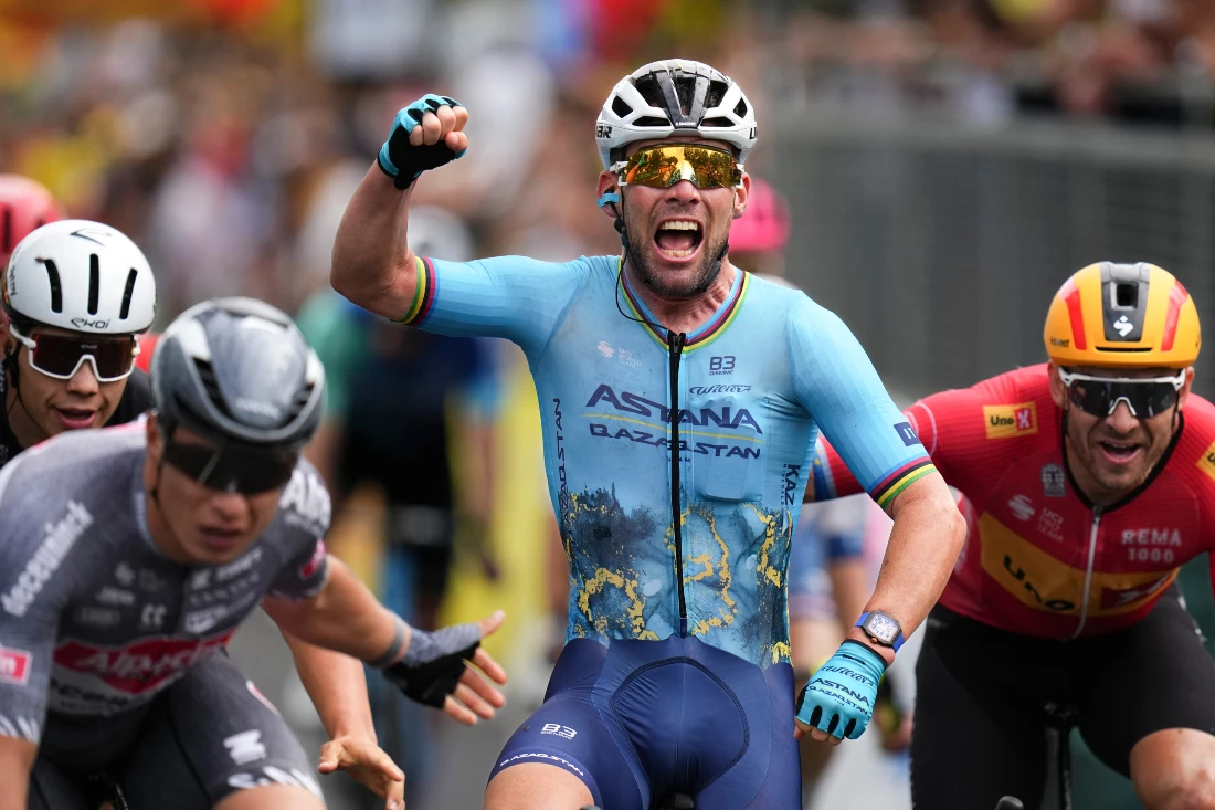Britain's sprinter Mark Cavendish crosses the finish line to win a record 35th Tour de France stage win and break the record of Belgian legend Eddy Merckx in the fifth stage of the Tour de France cycling race. (AP)
