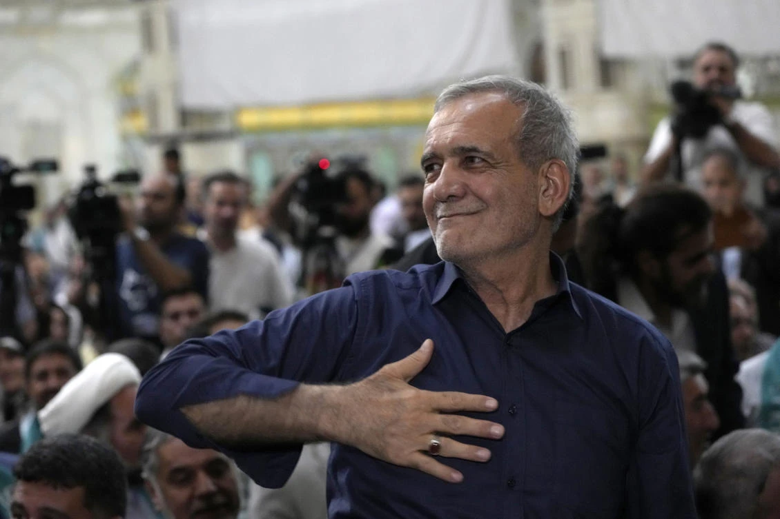 Iran’s President-elect Masoud Pezeshkian greets his supporters in a meeting a day after the presidential election, at the shrine of the late revolutionary founder Ayatollah Khomeini, just outside Tehran, on Jul. 6, 2024. (AP)