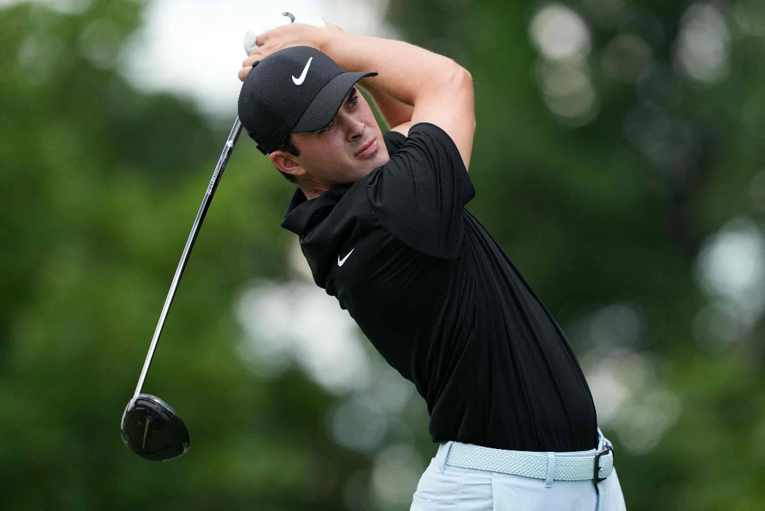 Davis Thompson of the US hits his tee shot on the 15th hole during the third round of the John Deere Classic at TPC Deere Run in Silvis, Illinois. (GETTY IMAGES NORTH AMERICA /AFP)