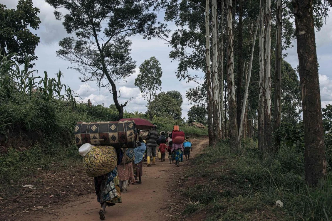 Civilians flee the fighting around Birundule in North Kivu province of the Democratic Republic of Congo on May 14, 2024. (AFP)