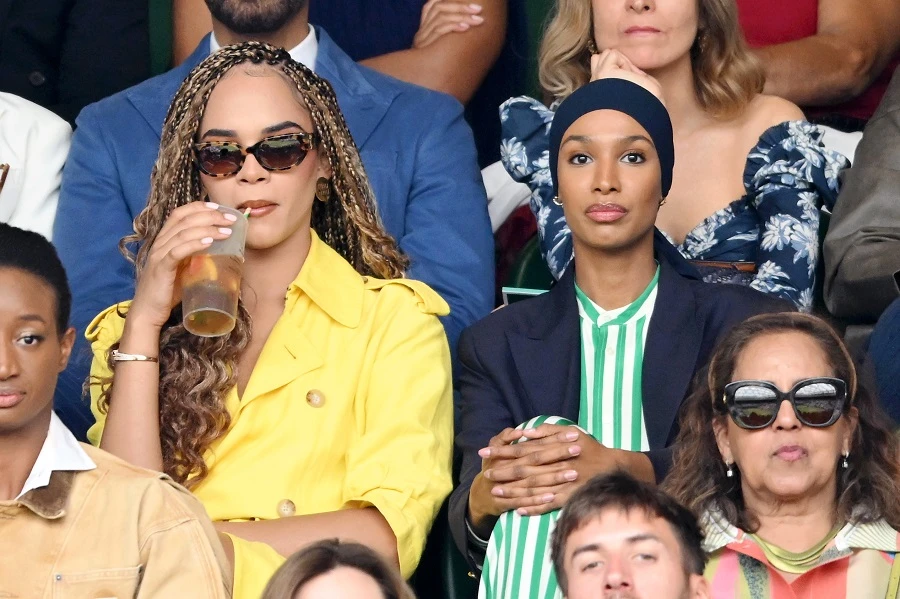 Yasmin Finney, left, and Ikram Abdi Omar attend day eight of the Wimbledon Tennis Championships. (Getty Images)