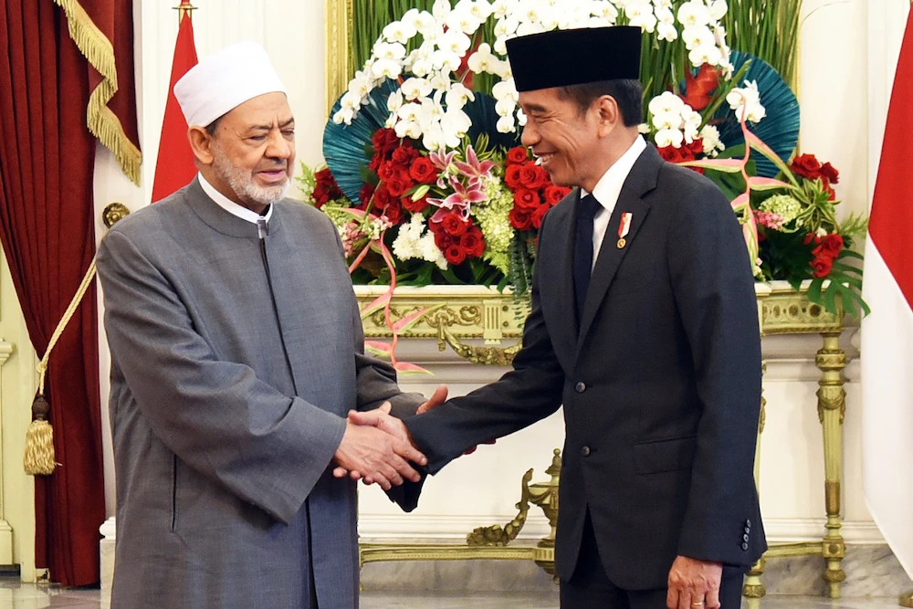 President Joko Widodo shakes hands with the grand imam of Al-Azhar Al-Sharif, Sheikh Ahmed Al-Tayeb, at the Merdeka Palace in Jakarta, Indonesia on July 9, 2024. (Indonesia Cabinet Secretariat)