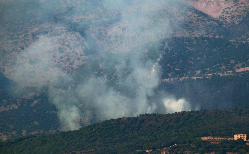 Smoke billows from the site of an Israeli airstrike on the outskirts of the southern Lebanese village of Habbariyeh, near the border with Israel, July 9, 2024. (AFP)