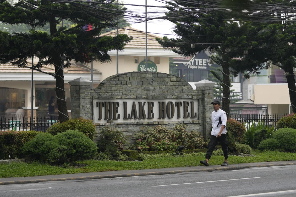 A man walks outside the Lake Hotel in Tagaytay city, south of Manila, Philippines on July 11, 2024. (AP)