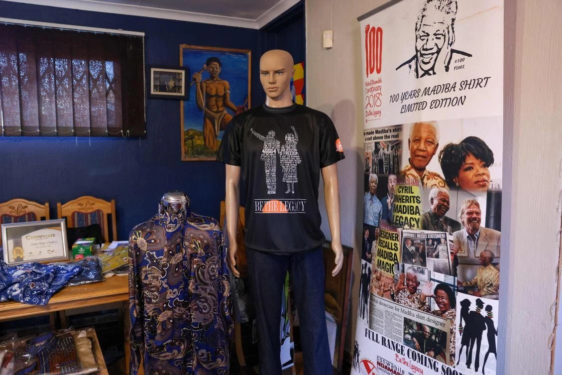 A general view of some of the latest designs of Sonwabile Ndamase, who used to design and style for the late former President of South Africa Nelson Mandela and the designer of the original Madiba shirt, in his studio in Johannesburg on July 4, 2024. (AFP)