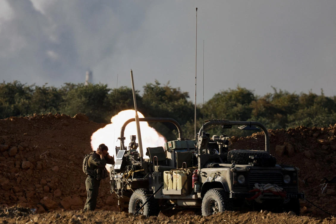 FILE PHOTO: An Israeli soldier fires a mortar, amid the Israel-Hamas conflict, near the Israel-Gaza border, in Israel, July 9, 2024. (REUTERS)