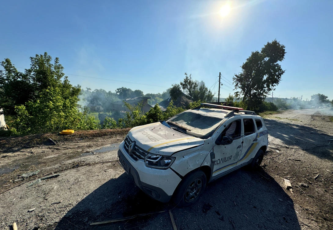 A view shows a damaged police car at the site of a Russian missile strike in the village of Budy, Kharkiv region, Ukraine on Jul. 13, 2024. (Reuters)