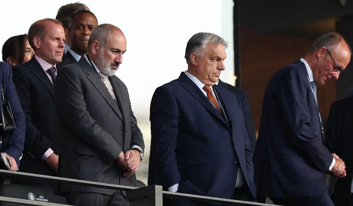 Hungary's Prime Minister Viktor Orban (C) and Armenia's Prime Minister Nikol Pashinyan (L) attend the UEFA Euro 2024 final football match between Spain and England at the Olympiastadion in Berlin on July 14, 2024. (AFP)