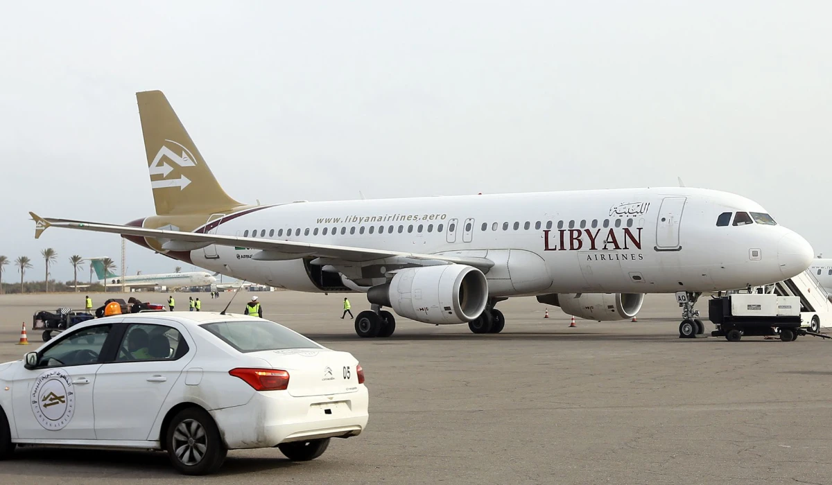 A plane sits on the tarmac after landing at Mitiga airport a few days after militiamen attacked it in an attempt to free colleagues held at a jail there, on the outskirts of the Libyan capital Tripoli, on January 20, 2018. (AFP file photo)