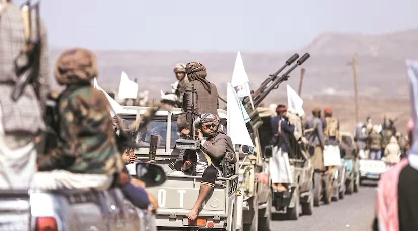 Houthi fighters gather in a show defiance after US and UK airstrikes on militia positions, near Sanaa, Yemen, Feb. 4, 2024. (Reuters)