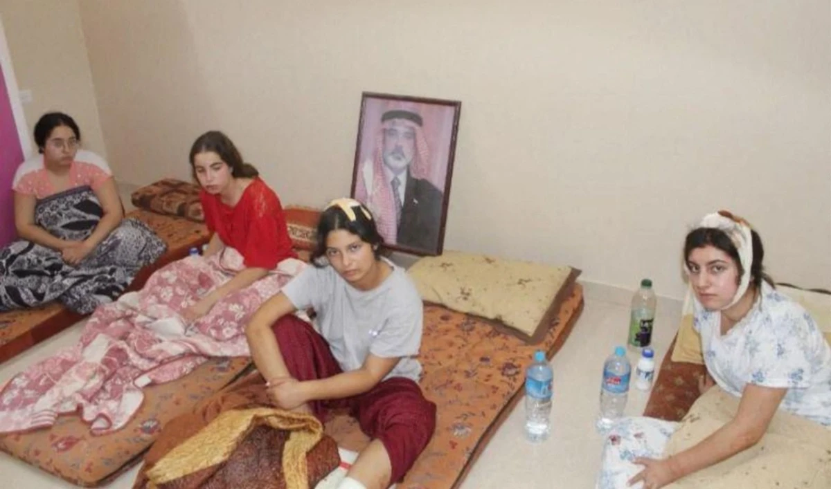An undated handout picture provided on July 16, 2024 by The Hostages Families Forum Headquarters, representing families of Israeli hostages held by Palestinian militants in Gaza, shows hostages (L - R) Liri Albag, Agam Berger, Daniella Gilboa, and Karina Ariev, at an unknown location during the early days of captivity. (AFP)