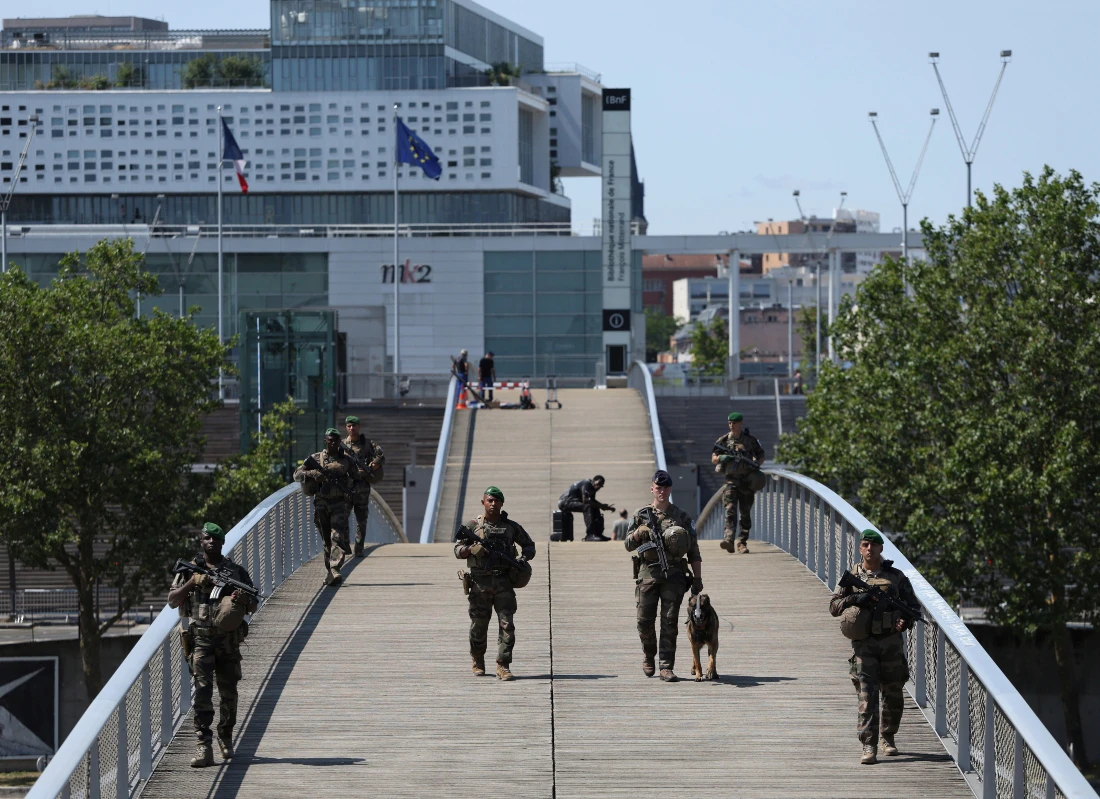 France's armed forces held a demonstration of the security measures planned on the River Seine, both in and out of the water, to make it safe for athletes and spectators during the opening ceremony of the Olympics. (AP)