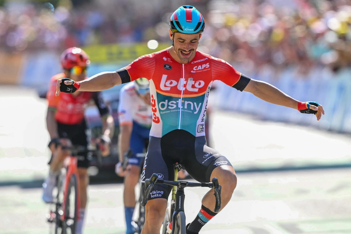 Lotto Dstny team's Belgian rider Victor Campenaerts cycles to the finish line to win the 18th stage of the 111th edition of the Tour de France cycling race, 179,5 km between Gap and Barcelonnette, in southeastern France, on Thursday. (AFP)