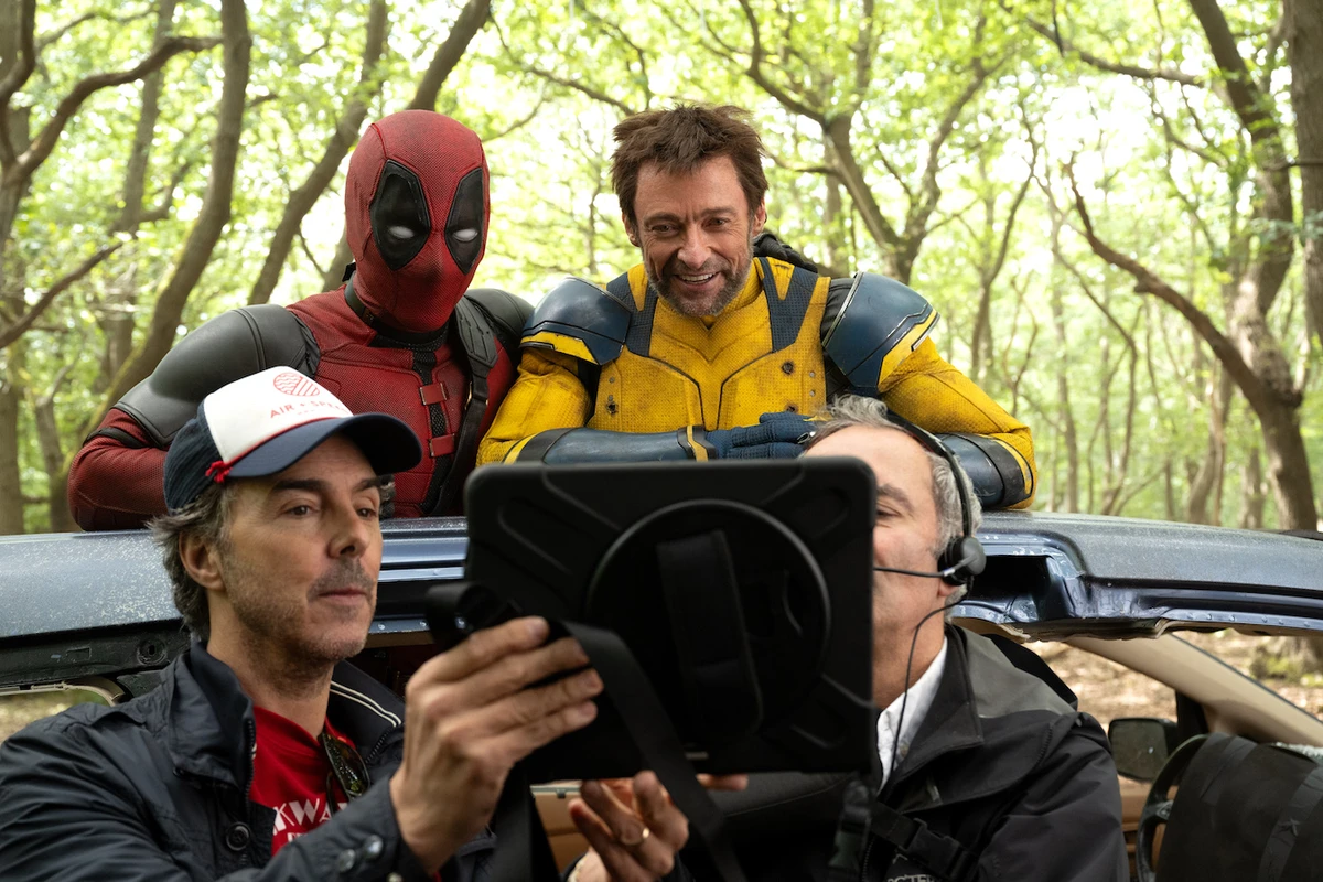 (L-R) Shawn Levy, Ryan Reynolds and Hugh Jackman on the set of 'Deadpool and Wolverine.' (Supplied)