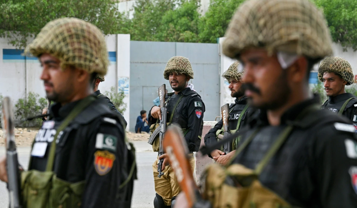 Security personnel stand guard in Karachi on July 16, 2024. (AFP)