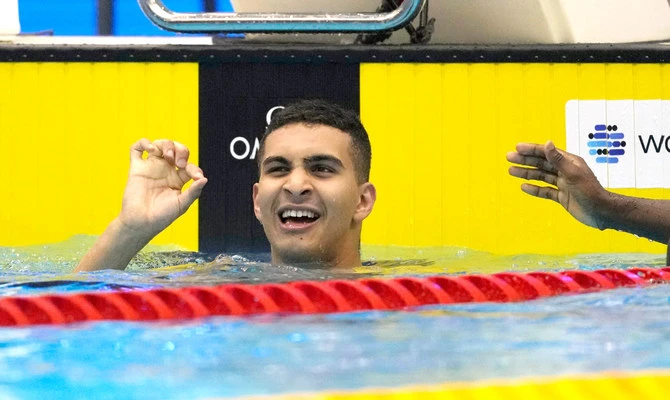Palestinian swimmer Yazan Al Bawwab reacts during the men's 100m freestyle heats at the World Swimming Championships in Fukuoka, Japan. (AP/File)