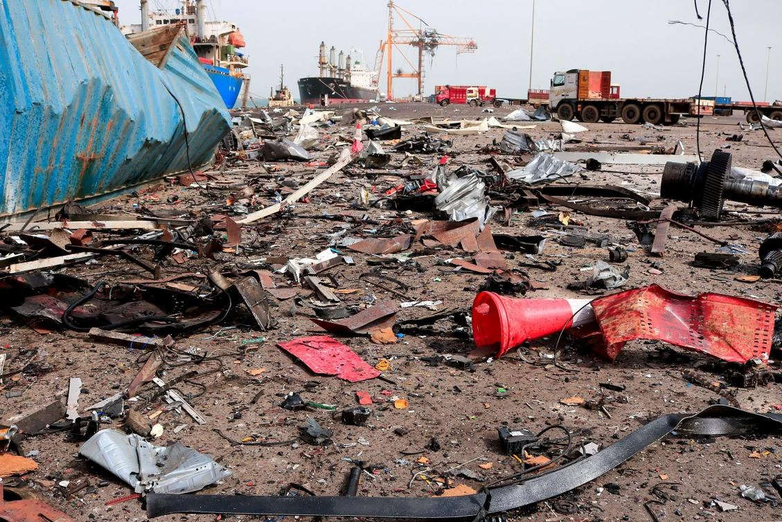 Debris litters a loading dock a day after Israeli strikes on the port of Yemen’s Houthi-held city of Hodeida on Jul. 21, 2024. (AFP)