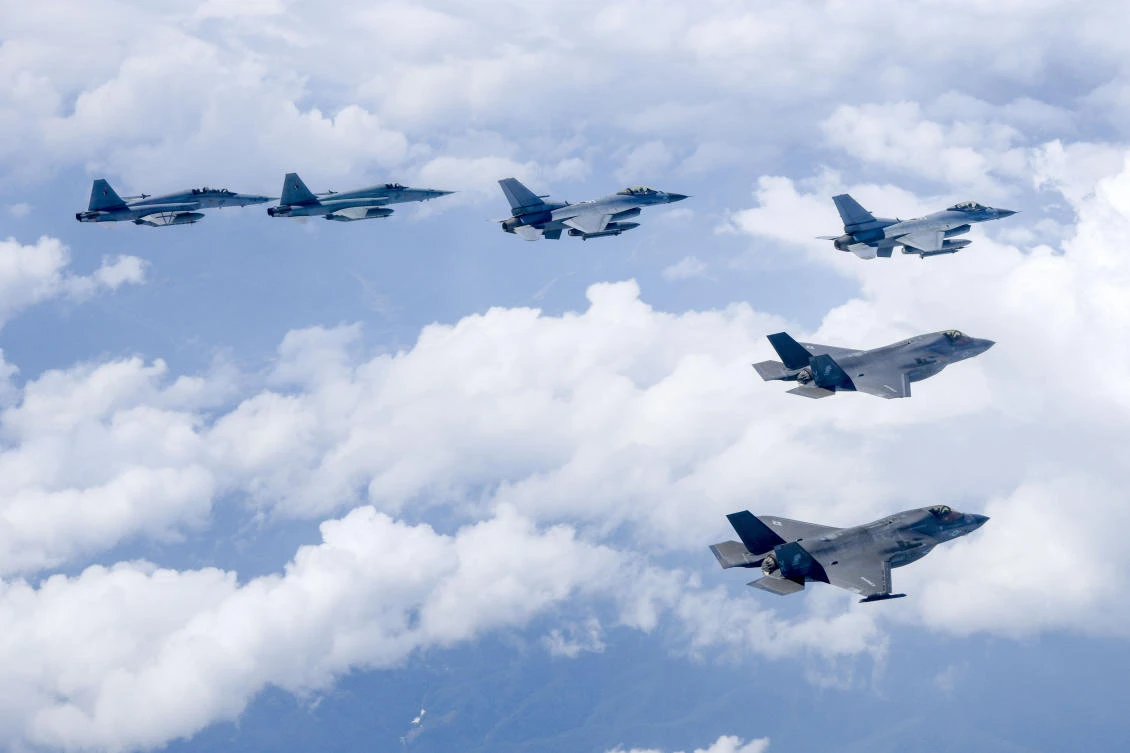 US Marine F-35B fighter jets, right bottom, South Korean Air Force KF-16 fighter jets and F-5 fighter jets, left top, fly over the Korean Peninsula during a joint air drill on July 24, 2024. (South Korea Defense Ministry via AP)
