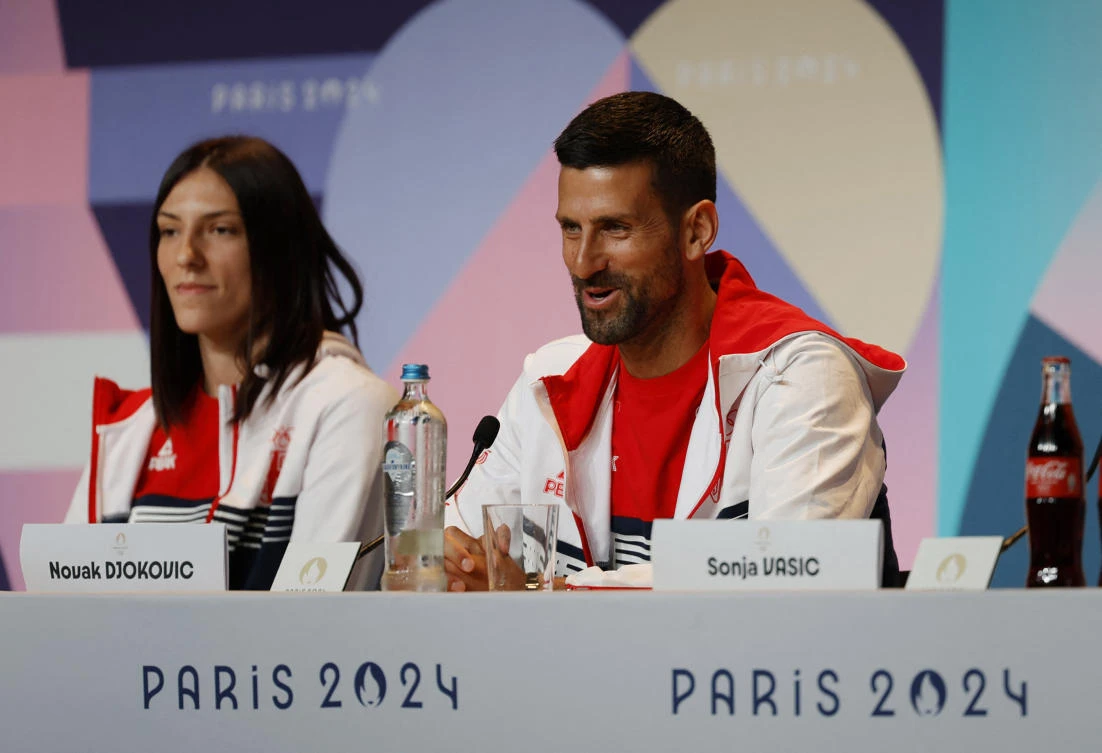 Tijana Boskovic and Novak Djokovic during a team Serbia press conference at the Paris 2024 Olympics Main Press Center, Paris, on Jul. 25, 2024. (Reuters)