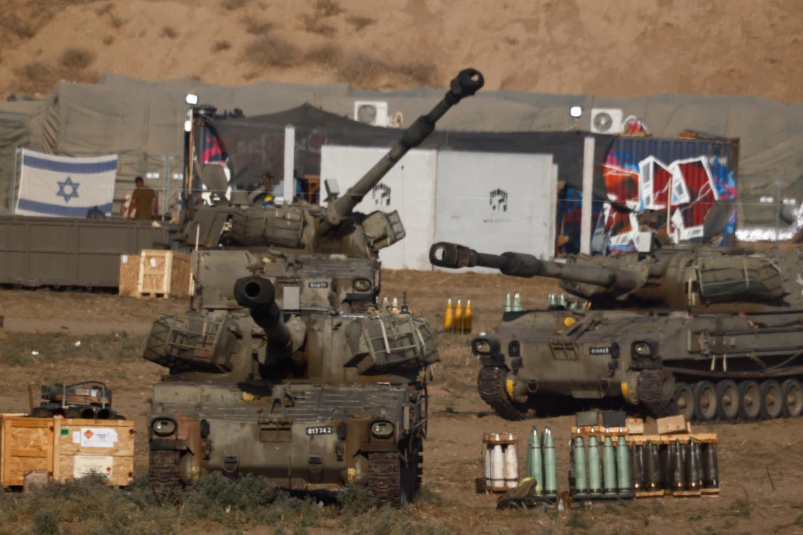 Israeli mobile artillery units stand near the Israel-Gaza border, amid the conflict between Israel and Hamas, in Israel, July 25, 2024. (Reuters)