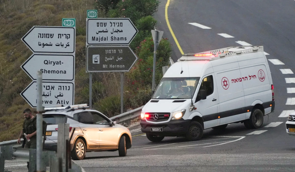 An Israeli ambulance returns from Majdal Shams after rockets were launched across Lebanon's border with Israel which, according to Israel's ambulance services critically injured multiple people at a soccer pitch in Majdal Shams, a Druze village in the Israeli-occupied Golan Heights, July 27 2024. (REUTERS)
