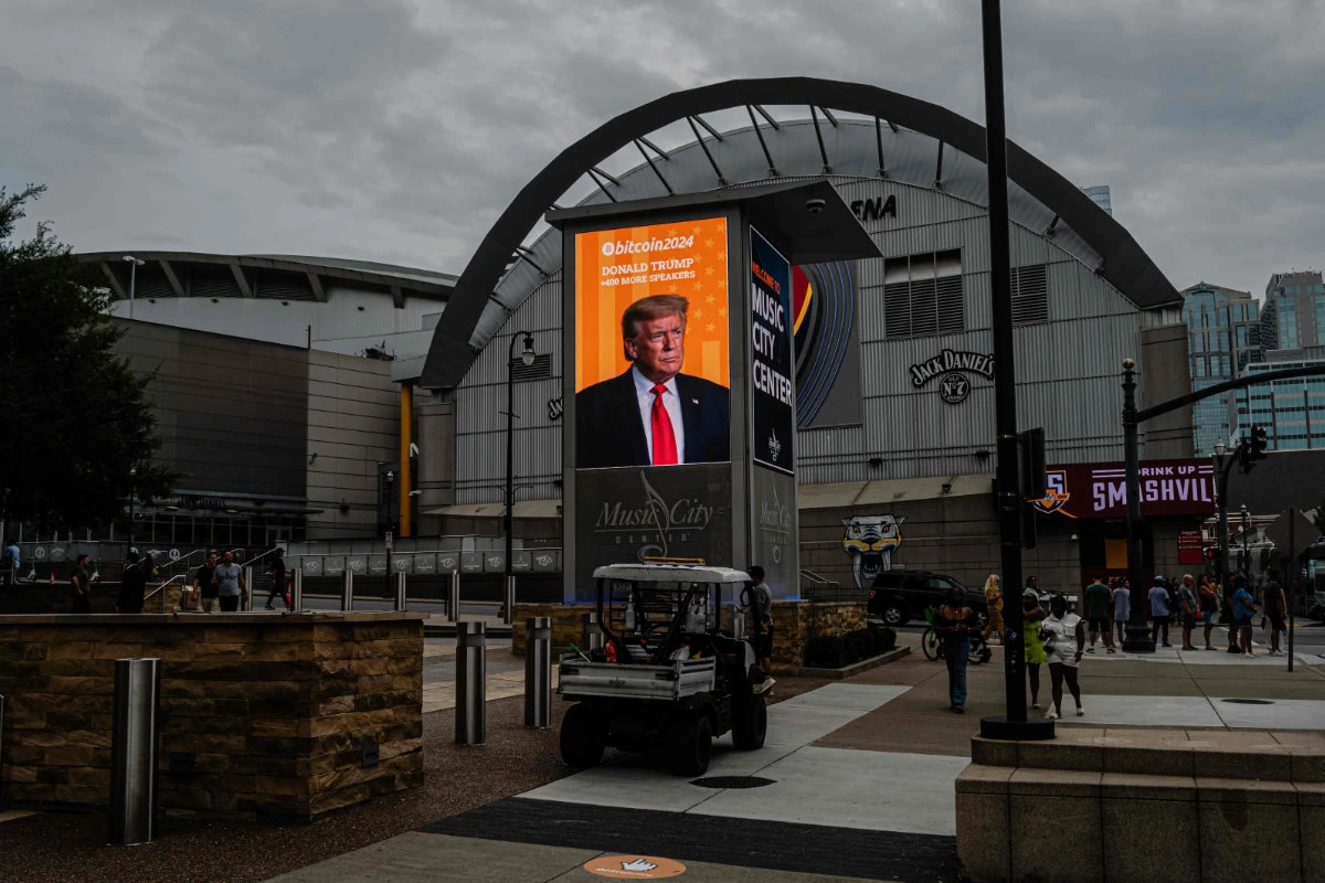 Former President Donald Trump's photograph is seen on a digital display outside of the venue ahead of his afternoon keynote speech on the final day of the Bitcoin 2024 conference at Music City Center July 27, 2024 in Nashville, Tennessee. (Getty Images/AFP)