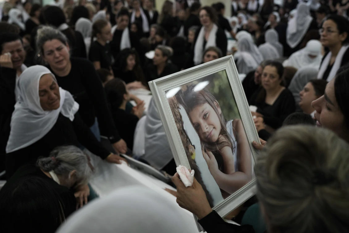 A rocket strike at a soccer field in the village has killed at least 11 children and teens in the deadliest strike on an Israeli target along the country's northern border since the fighting between Israel and the Lebanese militant group Hezbollah began. (AP)