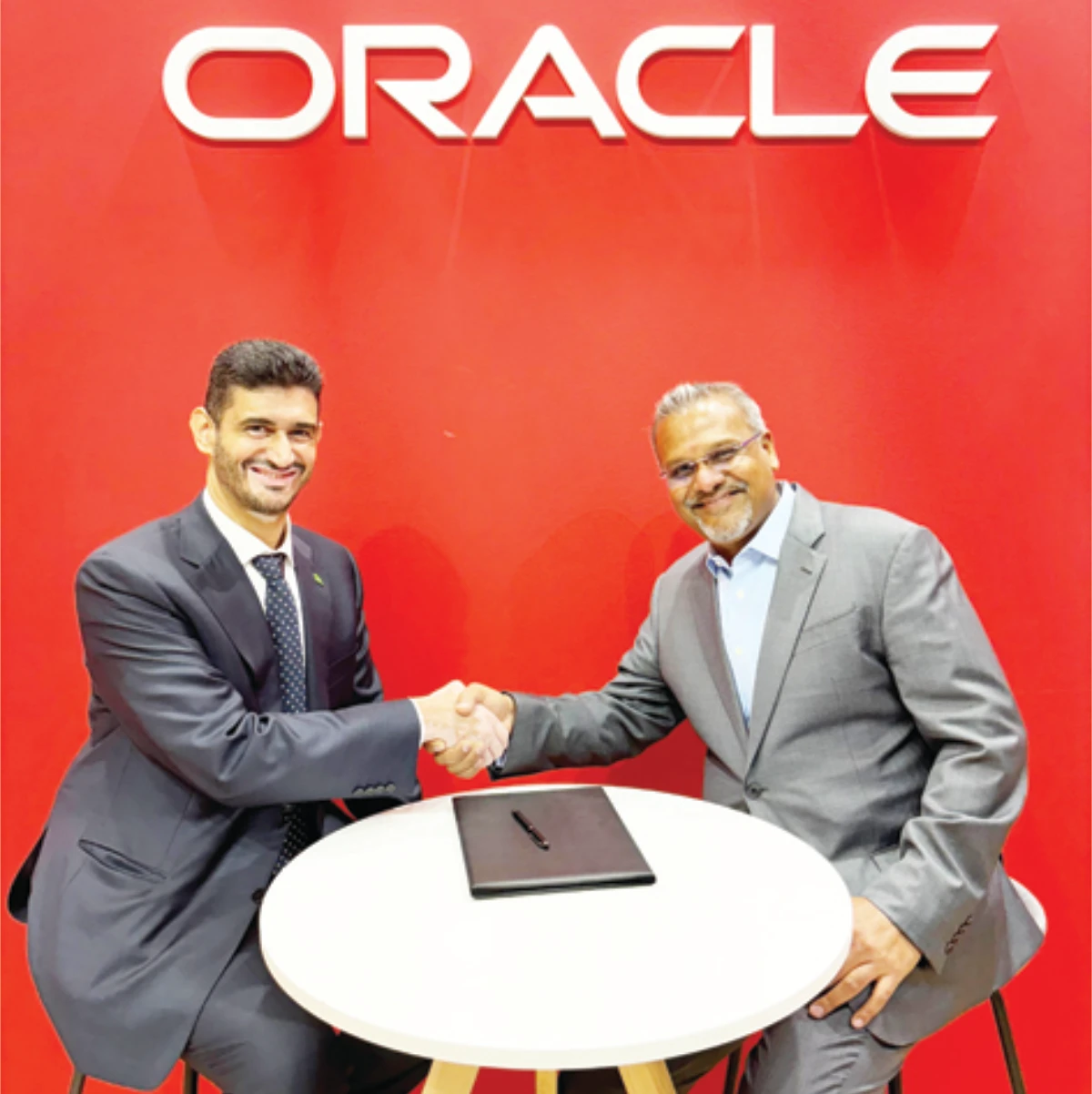 Ahmed Al-Anqari, CEO of Salam (left) with Ajay Goyal, group vice president, Oracle Communications.