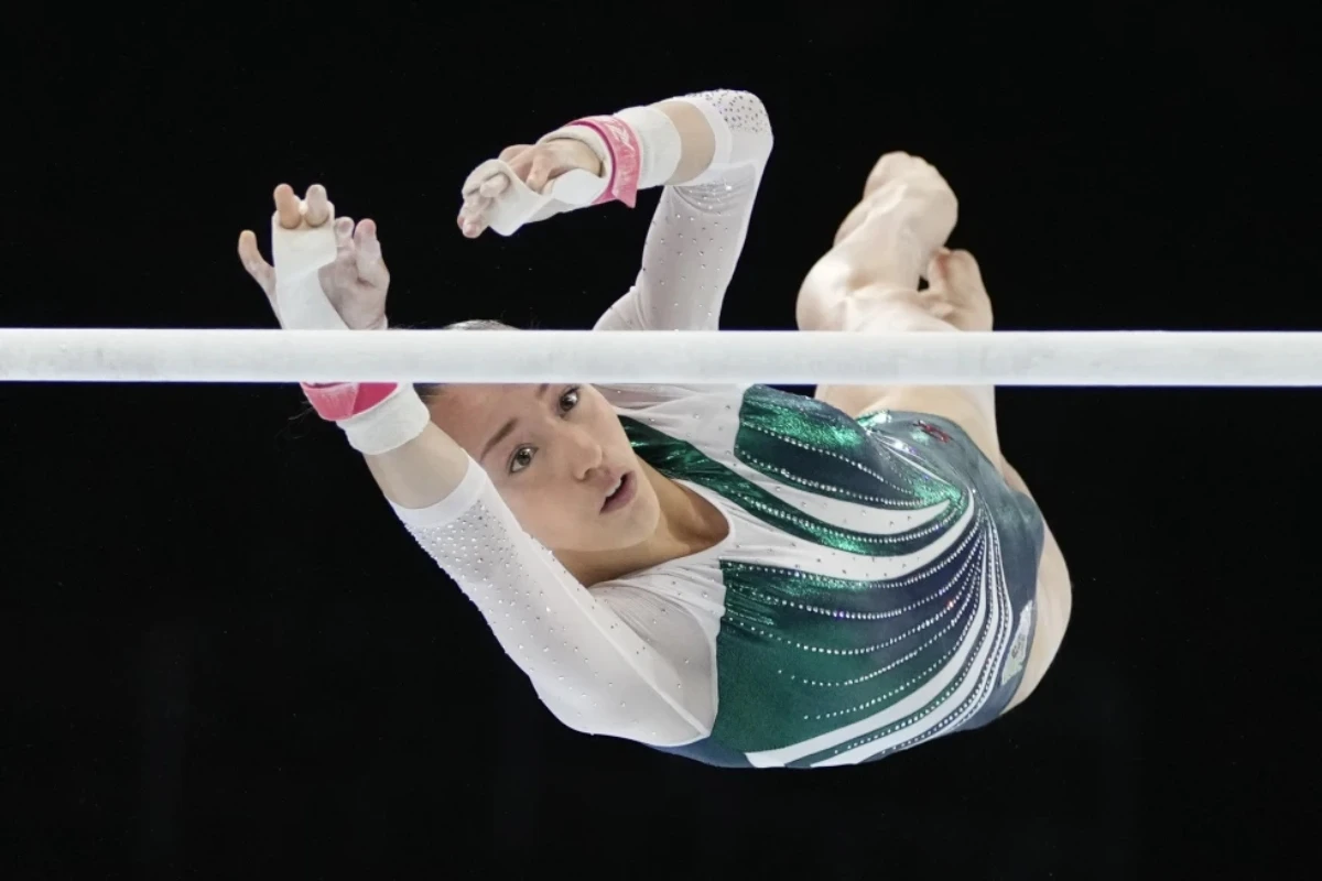 The 17-year-old athlete, one of the best in the world on uneven bars, was born in France. She grew up here, and still trains here. (AP)