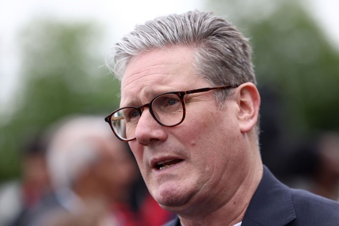 Keir Starmer said authorities would do “whatever it takes to bring these thugs to justice,” referring to the rioters. (AFP)