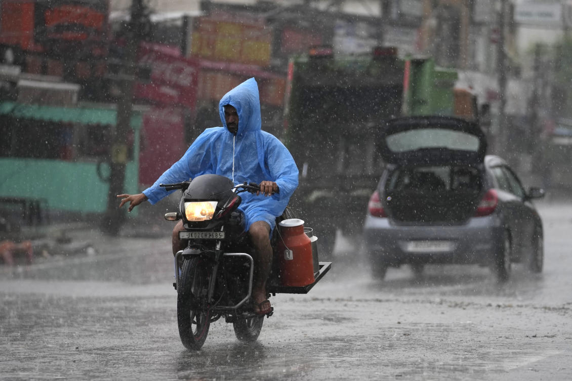 Delhi residents were caught unawares by a sudden bout of intense rain on Wednesday evening. India’s monsoon season runs from June to September. (AP)