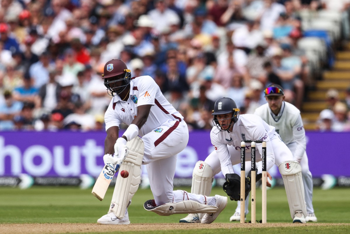 West Indies Jason Holder (L) plays a shot on the first day of the third Test cricket match between England and West Indies at Edgbaston in Birmingham on July 26, 2024 (AFP)
